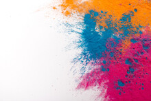 Freezing Of Colored Powder Explosions Isolated On A White Background