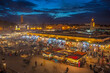 Place Djemaa el-Fna in Marrakech, Morocco, at twilight. The most famous tourist hotspot in Marrakech  located at the south end of the souk area.
