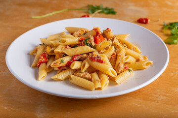 Wall Mural - Penne with tuna and peppers. Easy and quick recipe typical of Mediterranean cuisine