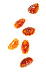 Sticker - Blood oranges isolated on white background. Sliced fruit studio shots.