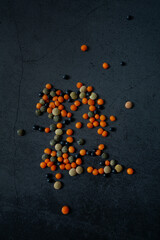 Wall Mural - lentil assortment on black stone surface