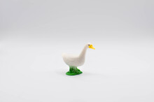 Duck.plastic Toy On A White Background.