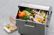 Garbage trash can, Image of food waste made in miniature.
The letters of pizza box are fictitious.
