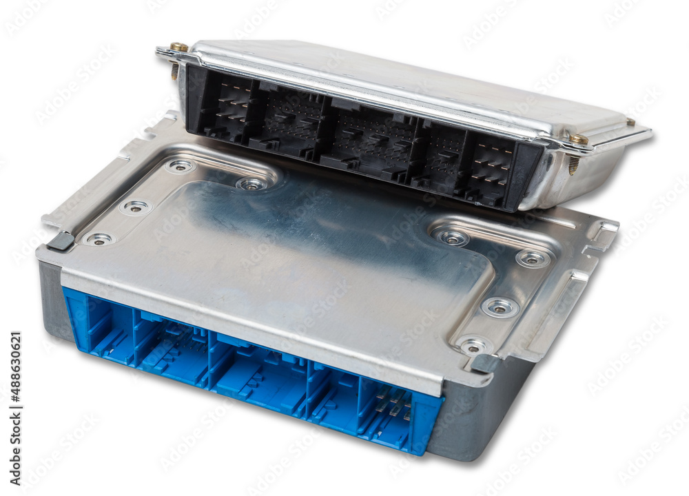 Engine Control Unit Capasitor Plastic car engine control unit with metal elements on a white isolated ...