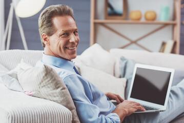 Wall Mural - Middle aged man working