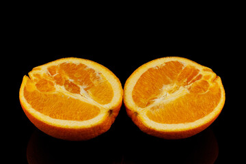 Sticker - Sliced orange on a black background