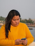 Fat Asian woman wearing a yellow shirt morning exercise in the park. The  concept of weight loss. Exercise for good health of obese people. 25790896  Stock Photo at Vecteezy