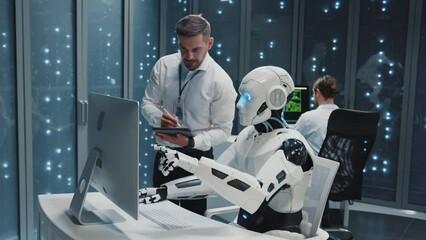 Wall Mural - futuristic data center office. artificial intelligence. automated ai cybernetic robot cooperating wi
