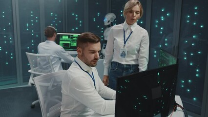 Wall Mural - successful team of male female it data managers using multiple computers receiving victory news cele