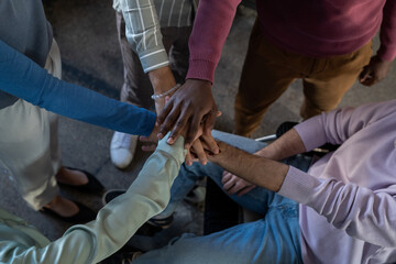 Aufkleber - Above angle of pile of hands of contemporary intercultural employees in smart casualwear standing in front of one another
