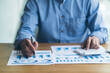 © PaeGAG - Financial businesswomen analyze the graph of the company's performance to create profits and growth, Market research reports and income statistics, Financial and Accounting concept.