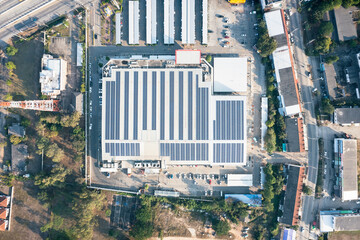 Wall Mural - Eco building or supermarket in aerial view consist of solar or photovoltaic cell in panel on top of roof. Technology to generate electrical power, direct current electricity by light for future.
