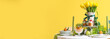 Beautiful dining table served for Easter celebration on yellow background with space for text