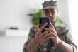 © Angelov - military man with phone, cyber police, information war
