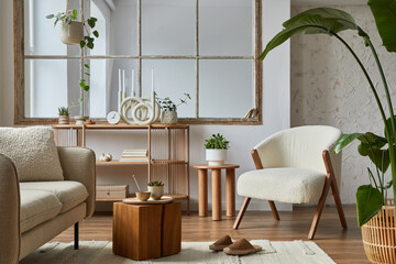 Stylish compositon of modern living room interior with frotte armchair, sofa, plants, wooden commode, side table and elegant home accessories. Home staging. Template. Copy space.