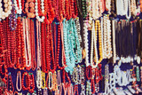 Fototapeta  - Colorful beads in the souvenir shop close up