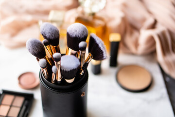 Wall Mural - Set of luxurious black makeup brushes in leather case