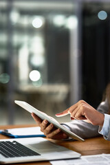 Aufkleber - Work smarter, work better. Cropped shot of a businesswoman using a digital tablet and laptop at her desk in a modern office.