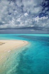 Wall Mural - Sandy beach at the tip of Mouli Island in Ouvea lagoon, Loyalty Islands, New Caledonia.