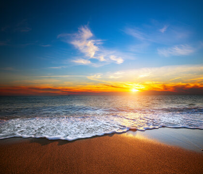 Fototapete - Beautiful beach at sunset time