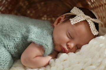 Canvas Print - Adorable newborn baby sleeping on soft plaid, closeup