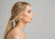 Leinwandbild Motiv Woman Face Profile. Young Girl Portrait with Smooth healthy Skin. Model Facial Side View over Gray. Body and Neck Skin Care Cosmetology