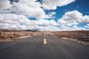 Sticker - A view of skyscape on Daocheng asphalt highway in Ganzi, Sichuan, China