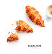Fresh croissants and coffee cup layout.