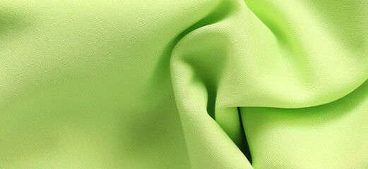 Green silk satin background. Copy space for text. Background Christmas, Anniversary.