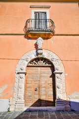 Sticker - Entrance door to an ancient noble house in Montecalvo Irpino, an old village in the province of Avellino, Italy.