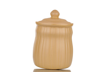 Wall Mural - One ceramic food storage jar, macro, isolated on a white background.