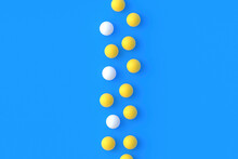 Scattered Ping Pong Balls On Blue Background. Leisure Games. International Competitions. Sports Equipment. Table Tennis. Top View. Copy Space. 3d Render