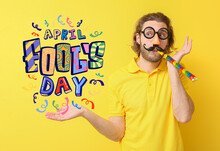 Funny Young Man In Disguise And With Party Whistle On Yellow Background. April Fools' Day Celebration