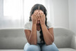 © Louis-Paul Photo - Stressed miserable black woman suffer from grief problem, depressed lonely upset african girl crying alone on sofa