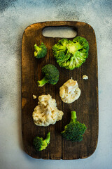 Wall Mural - Healthy raw food concept with slice of cauliflower