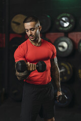 Sticker - Strong muscular European guy with cool tattoos working out in a gym