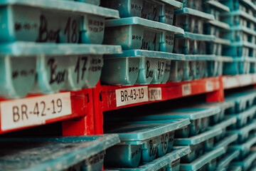 Gold mining storage rock core samples geology drilling industy. Large ore warehouse in modern industry, ores stacked in boxes. Selective focus 