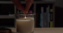 Human Hand Lighting A Scented Candle With A Match In 60fps, Slow Motion