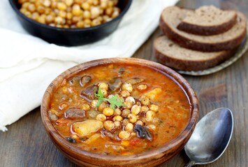 Sticker - CHICKPEA AND BEEF STEW, soup with chickpeas and meat, hearty chowder, latin cuisine