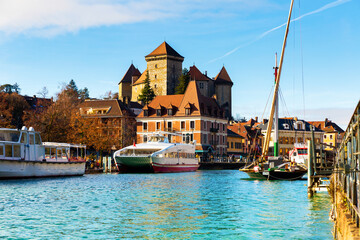 Wall Mural - Medieval city of Annecy with Thiou canal at sunny winter day, Haute Savoie department in Auvergne Rhone Alpes region, France