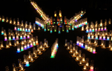 Sticker - Colorful candlelight on the ground during the Christmas season