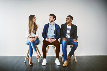 Aufkleber - Shes ready to make a great first impression. Shot of a group of young businesspeople waiting in line for a job interview.