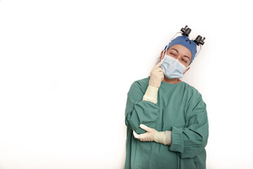 Doctor surgeon shocked, funny. Woman closeup portrait of young doctor, surgeon or nurse surprised starring with big eyes wearing surgical mask.