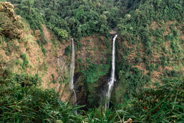 Wall Mural - the tad fane waterfall, on the bolaven plateau in laos. high twin waterfalls