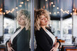 © Eva - portrait of relaxed business woman with eyes closed in cafe leaning on glass. Business concept
