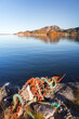 Coastal Norwegian landscape with rusty anchor
