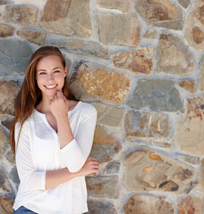 Canvas Print - She didnt have a care in the world. A pretty young woman standing outside on a sunny day.