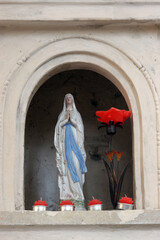 Wall Mural - Our Lady of Lourdes, statue in the church of the Assumption of the Virgin Mary in Glogovnica, Croatia