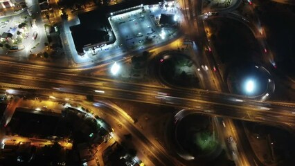 Sticker - HD time-lapse aerial view of the traffic cars crossing the lit bridges in the night