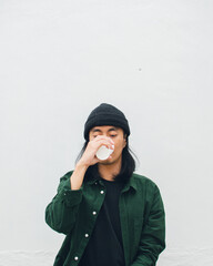 portrait of a person drinking coffee